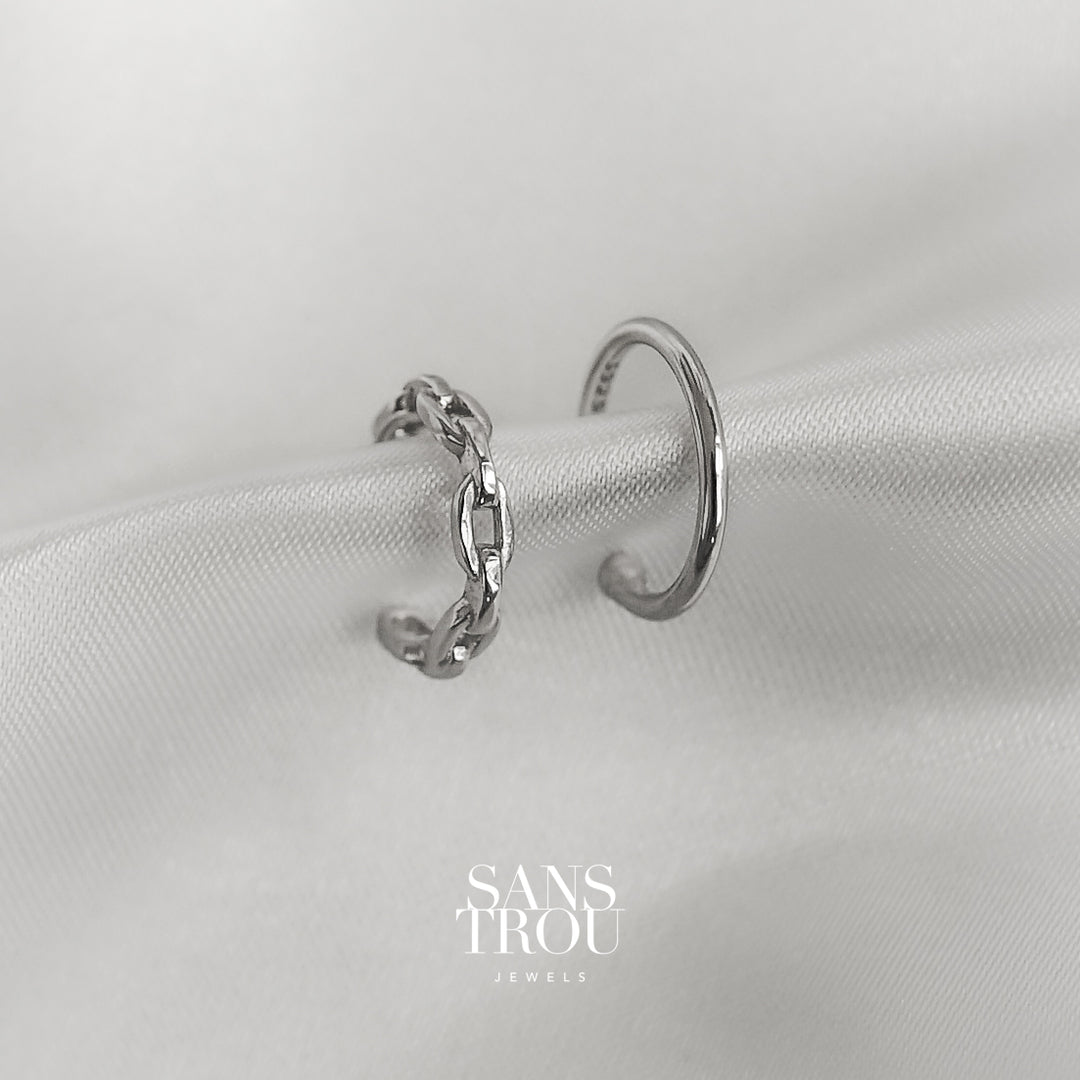 SANS TROU Odette ear cuff set features two dainty silver ear cuffs. one is a chain, the other is a solid band. hypoallergenic, sterling silver ear cuffs