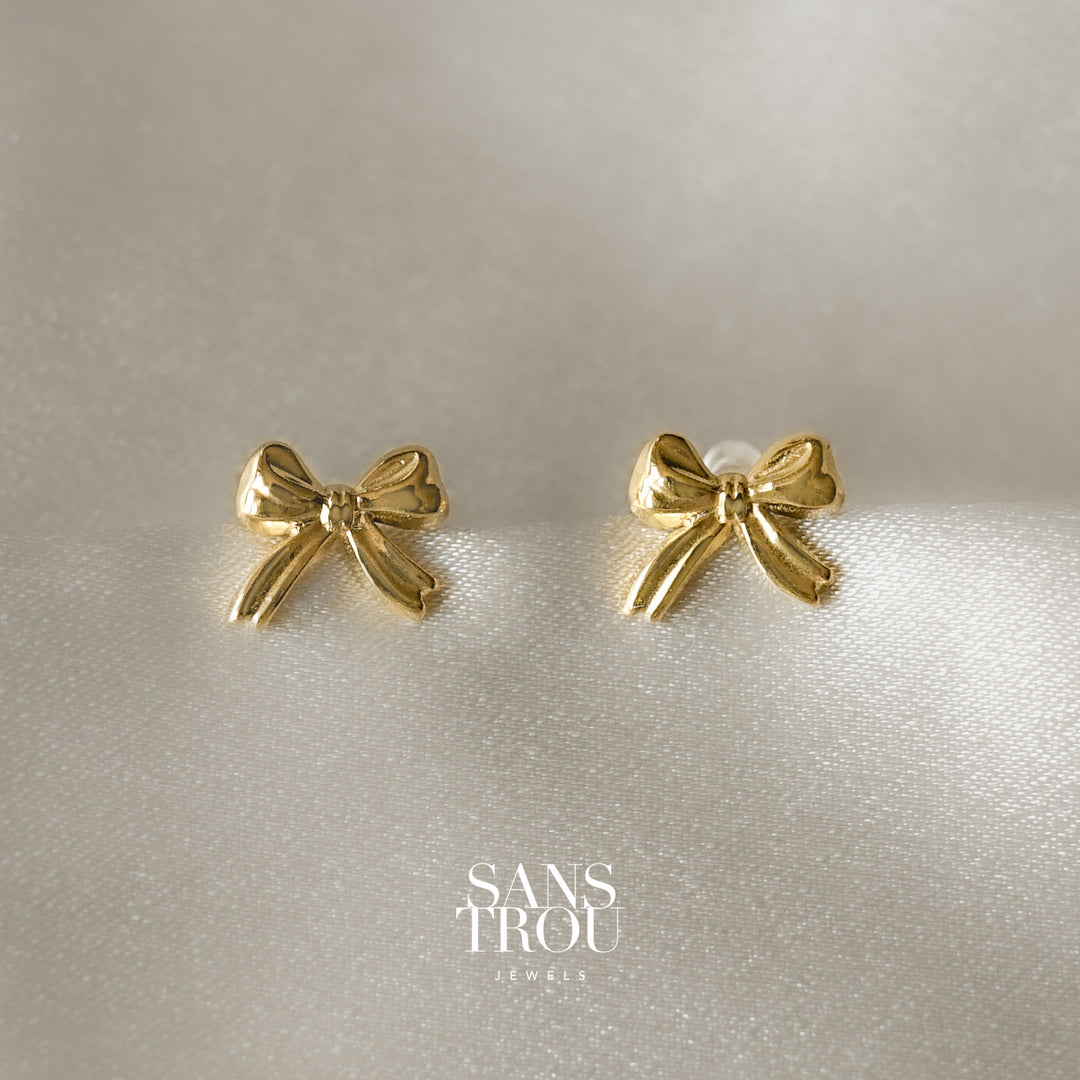 Gold bow clip-on stud earrings
