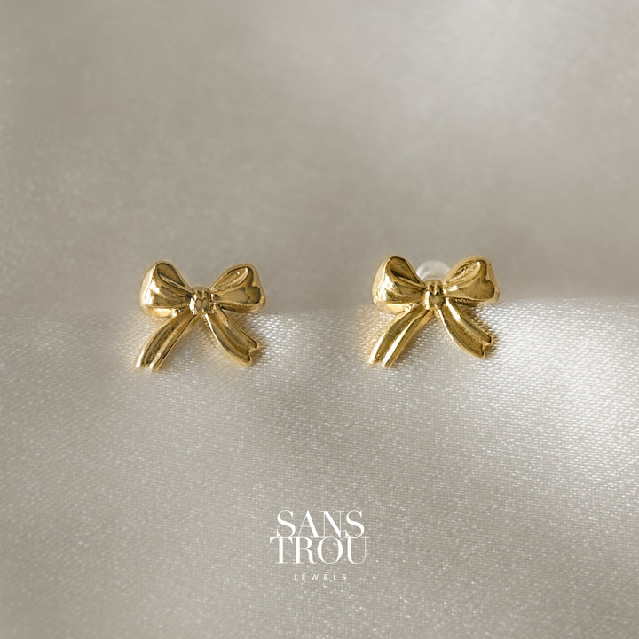 Gold bow clip-on stud earrings