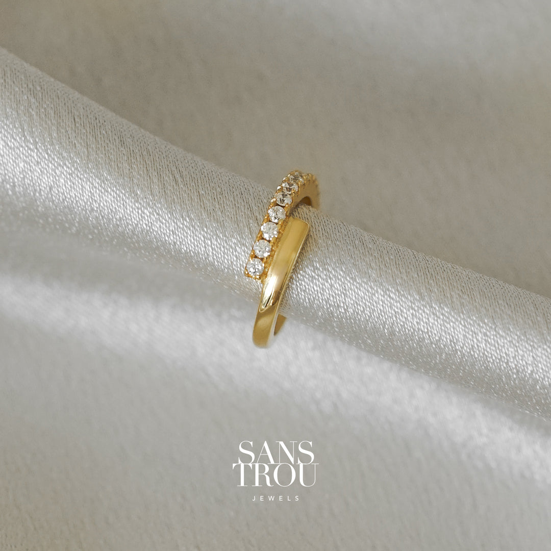 Sans Trou 18k gold plated ear cuff with two adjacent bars forming a subtle Z shape. One of the bars feature CZ stones.     