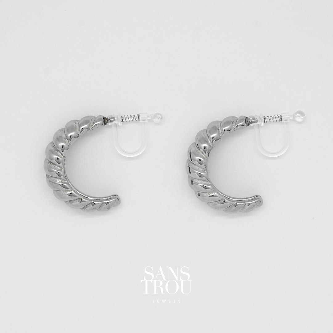 Chloe clip-on hoop with spring clip. Croissant shape in silver.