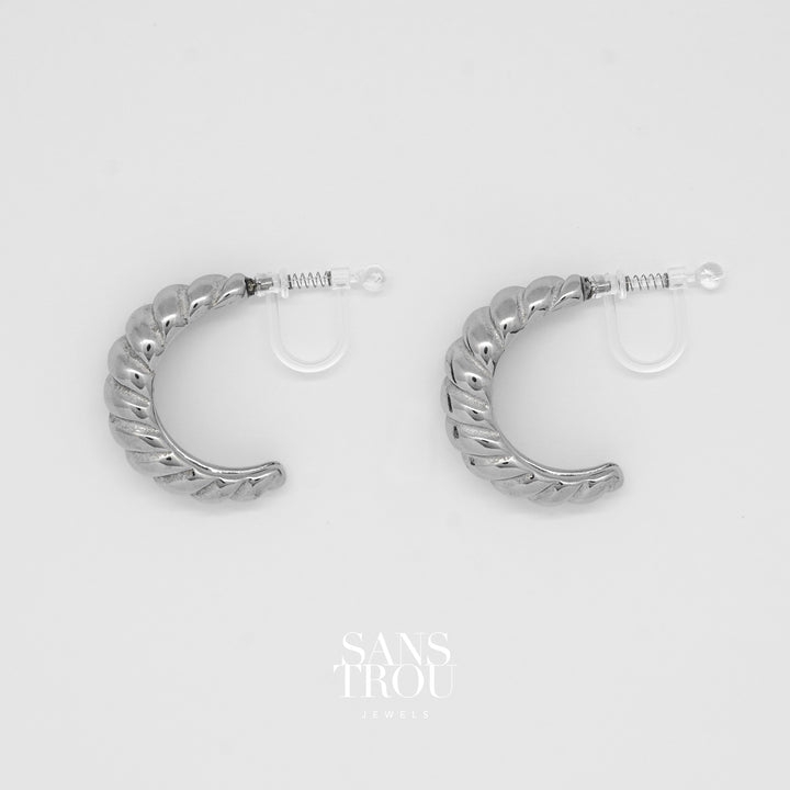 Chloe clip-on hoop with spring clip. Croissant shape in silver.
