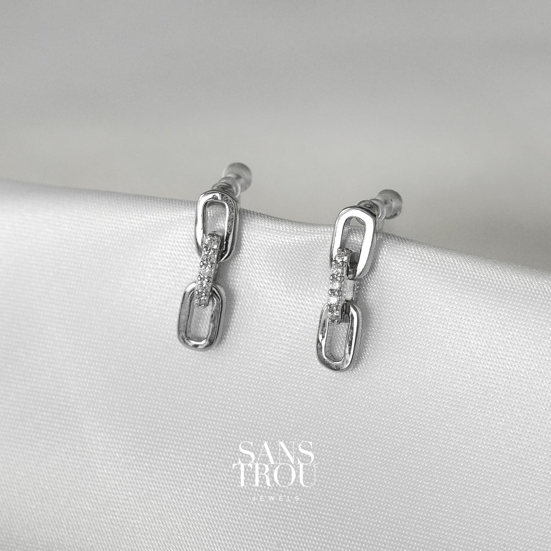Sans Trou silver chain drop clip-on earring with CZ stones. The petit version of the Emilie clip-on with a two sequence chain. 