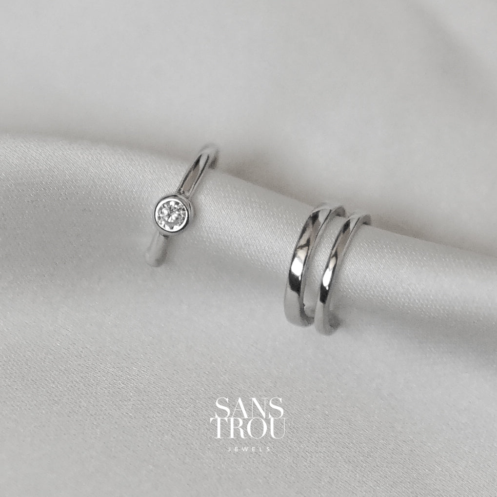 Sans Trou sterling silver ear cuff set featuring a double layer cuff and CZ stone cuff.  