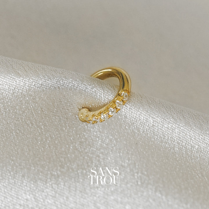 Sans Trou dainty helix ear cuff with 18k gold plating and CZ stones. 