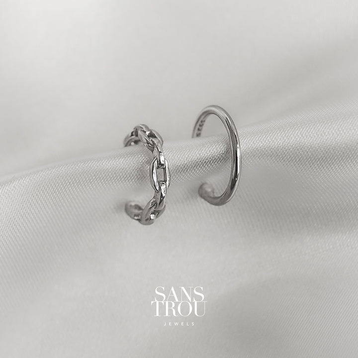 SANS TROU Odette ear cuff set features two dainty silver ear cuffs. one is a chain, the other is a solid band. hypoallergenic, sterling silver ear cuffs